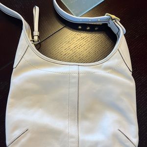Almost new white leather coach purse with adjustable strap